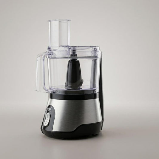 A countertop food processor with a brushed stainless steel base, black plastic components, and a clear plastic bowl and feed hopper, shown on a neutral light gray background. 220-240 Volt
50\60 Hz
500 Watts

2 Years Warranty

Features:
The power of this efficient chopper is 220-240v 50HZ 500W.
User friendly and easy to use. Large enough to cater all your delicacies. Easy to clean after usage. Ideal for chopping and mincing meat, beans, garlic, onion, gingers etc. It has an unparalleled quality of stainless 